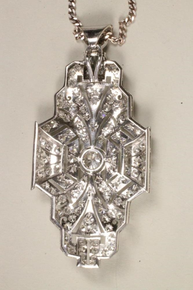 AN ART DECO DIAMOND PENDANT of quatrefoil form Image