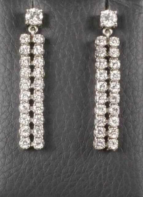 A PAIR OF DIAMOND DROP EARRINGS Image
