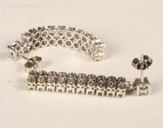 A PAIR OF DIAMOND DROP EARRINGS Image