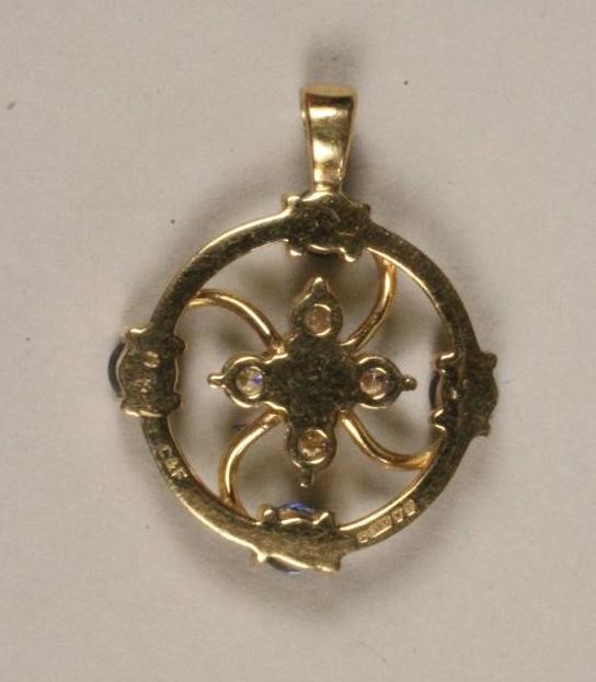 A SAPPHIRE AND DIAMOND SMALL PENDANT Image