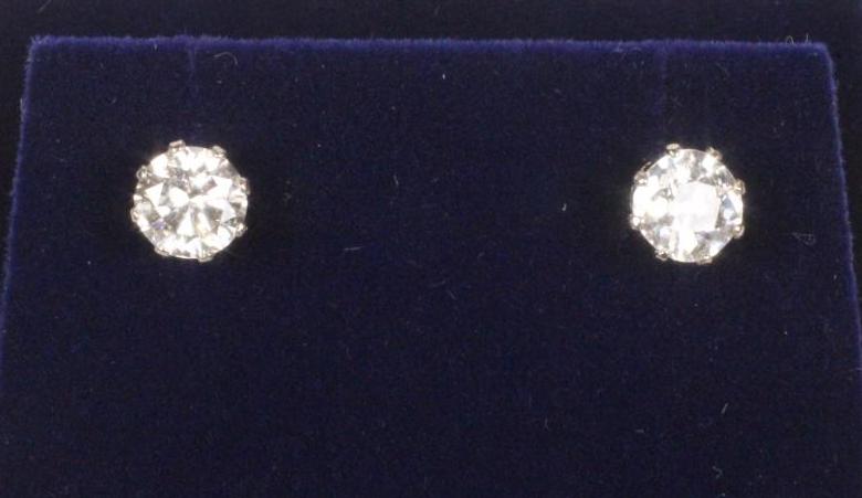 A PAIR OF DIAMOND EAR STUDS Image