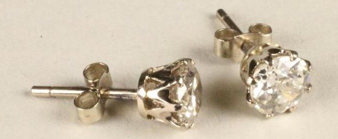 A PAIR OF DIAMOND EAR STUDS Image