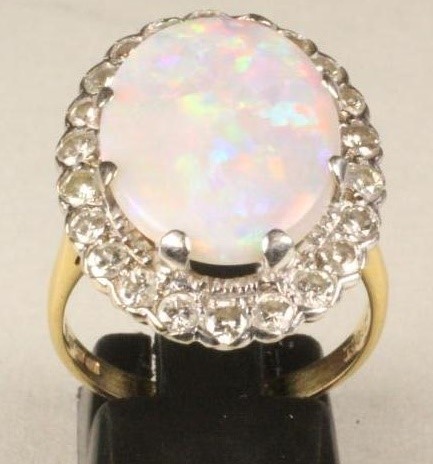 AN OPAL AND DIAMOND DRESS RING Image