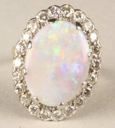 AN OPAL AND DIAMOND DRESS RING Image