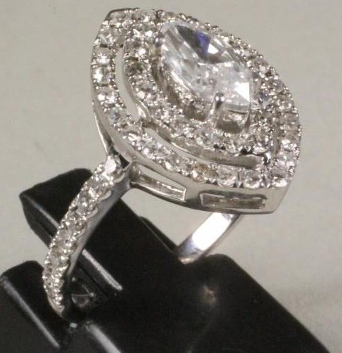 A DIAMOND CLUSTER RING Image