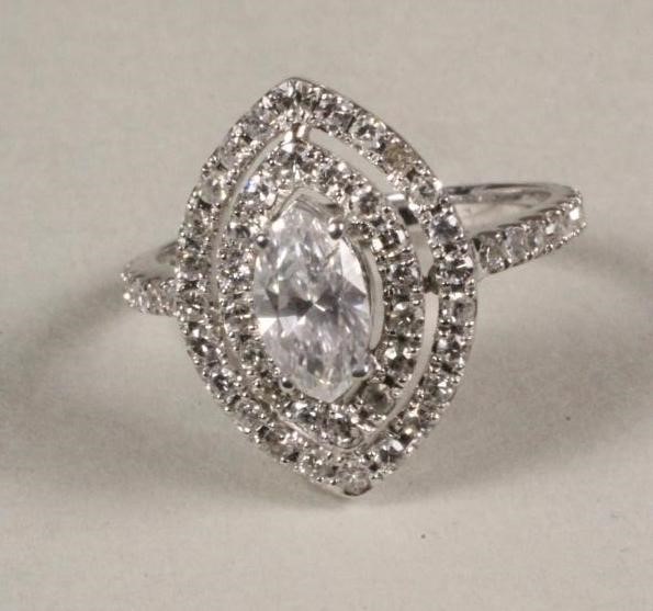 A DIAMOND CLUSTER RING Image