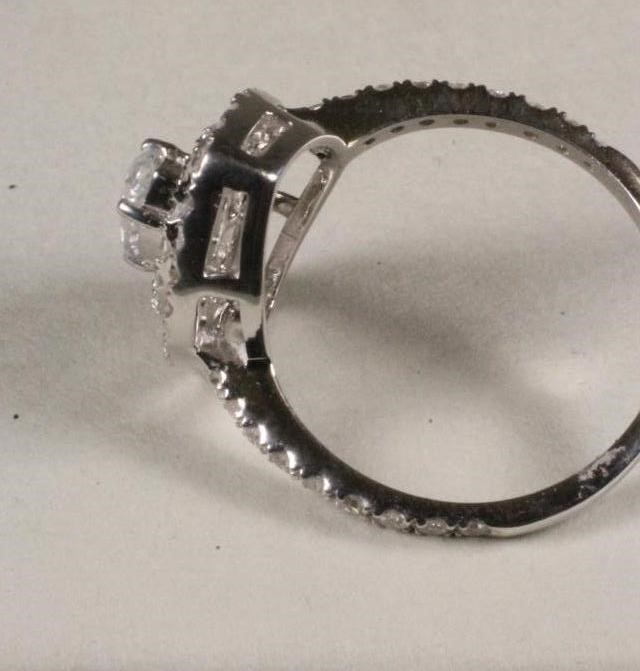 A DIAMOND CLUSTER RING Image