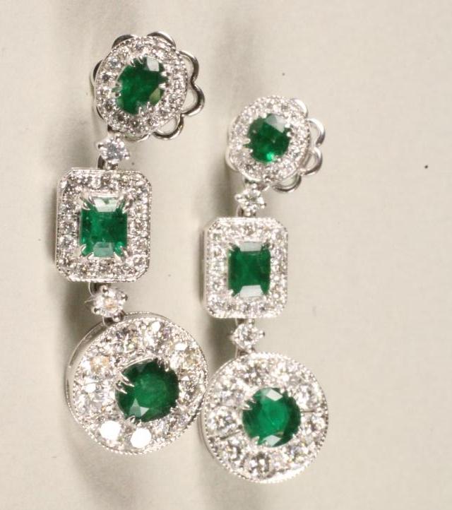 A PAIR OF EMERALD AND DIAMOND DROP EARRINGS Image