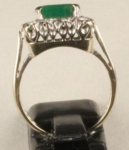 AN EMERALD AND DIAMOND PLAQUE RING Image