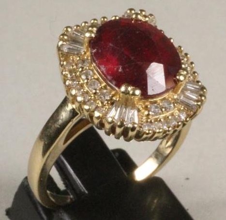 A RUBY AND DIAMOND CLUSTER RING Image