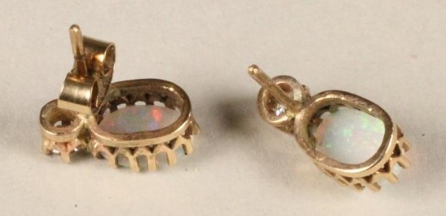 A PAIR OF OPAL AND DIAMOND EAR STUDS Image