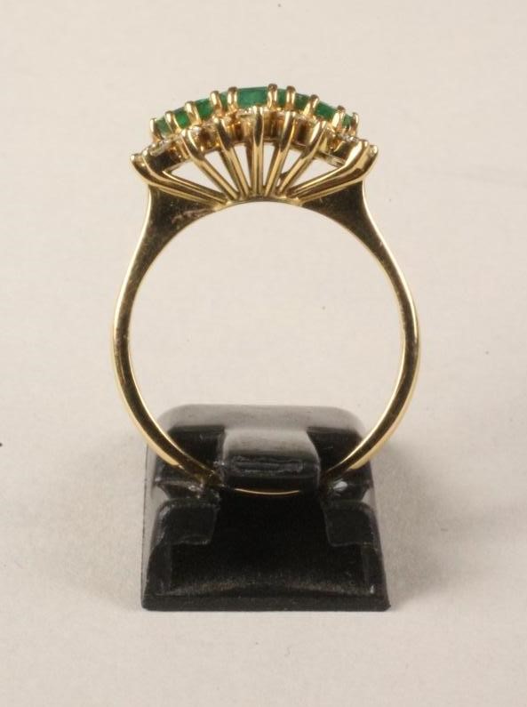 AN EMERALD AND DIAMOND DRESS RING Image