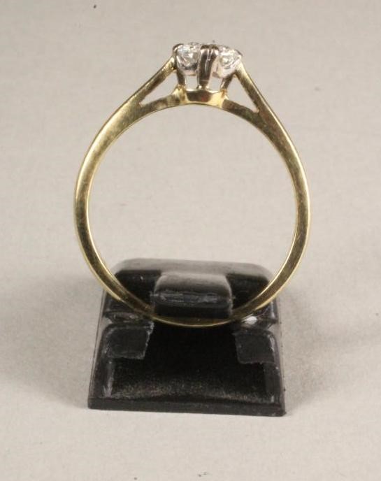 A SOLITAIRE DIAMOND RING Image