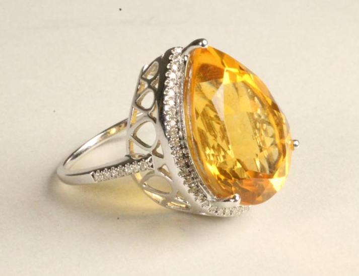 A CITRINE AND DIAMOND COCKTAIL RING Image