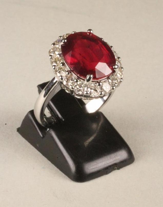 A RUBY AND DIAMOND CLUSTER RING Image