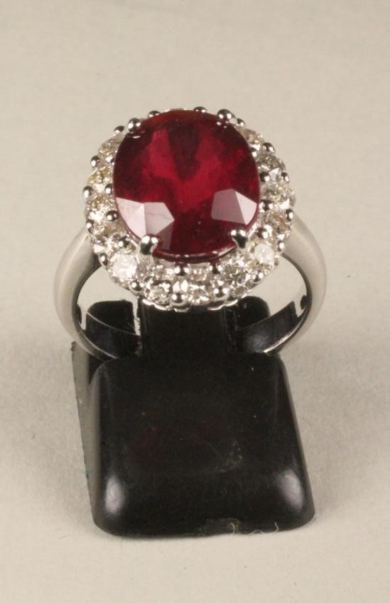 A RUBY AND DIAMOND CLUSTER RING Image