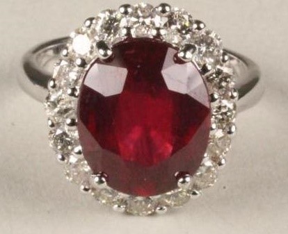 A RUBY AND DIAMOND CLUSTER RING Image