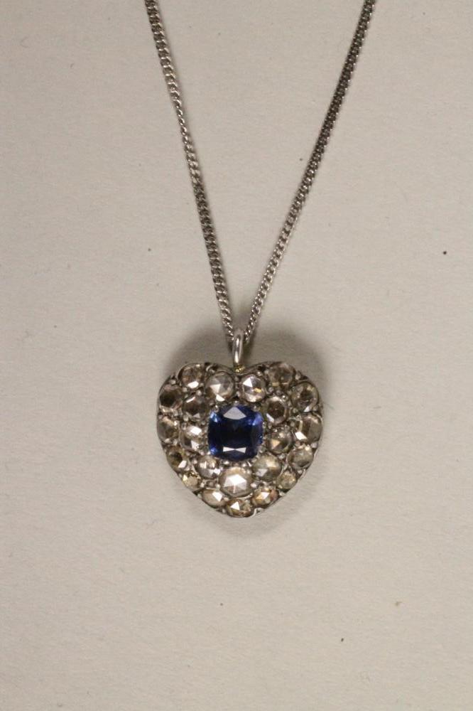 A VICTORIAN SAPPHIRE AND DIAMOND HEART SHAPED PENDANT Image