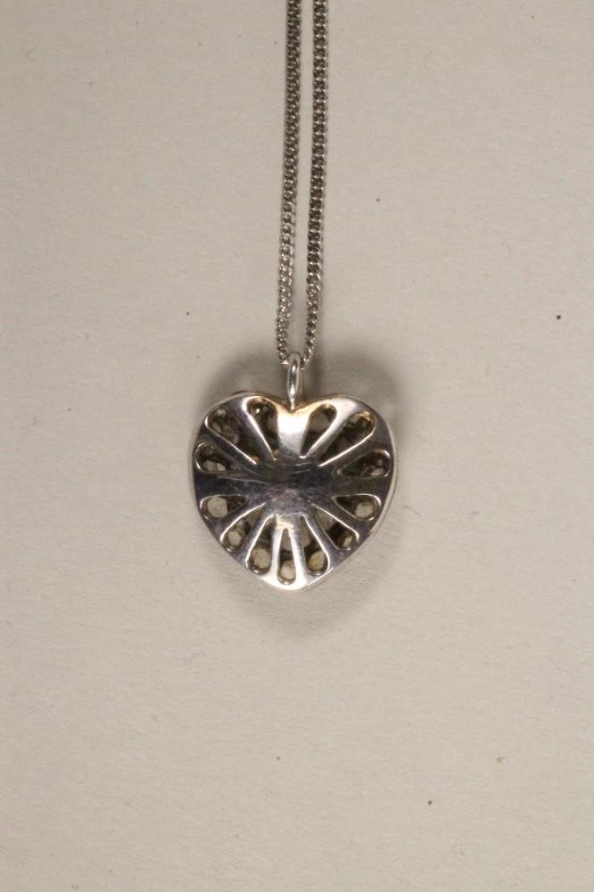 A VICTORIAN SAPPHIRE AND DIAMOND HEART SHAPED PENDANT Image