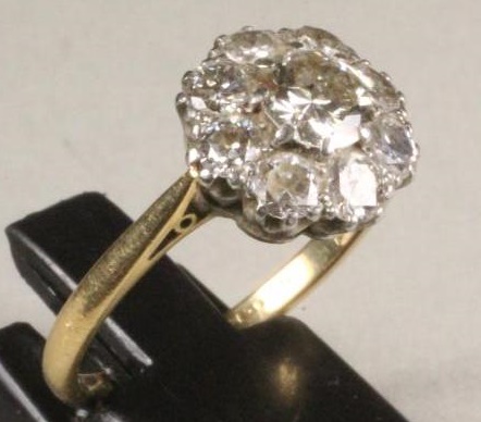 A DIAMOND CLUSTER RING Image
