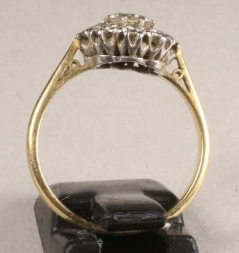 A DIAMOND CLUSTER RING Image