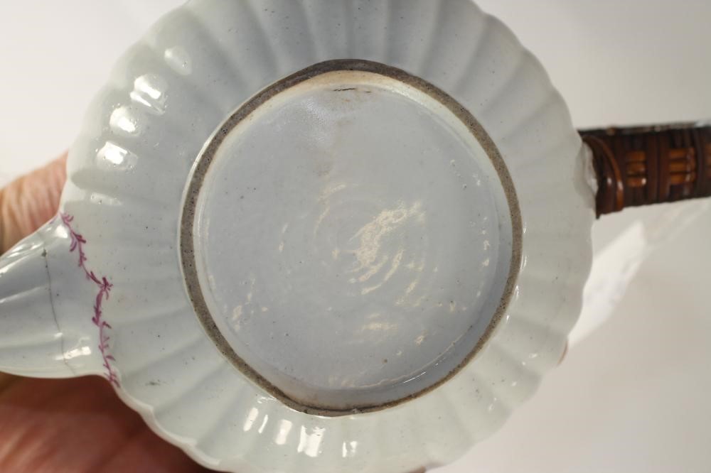 A CHELSEA PORCELAIN TEAPOT AND COVER Image