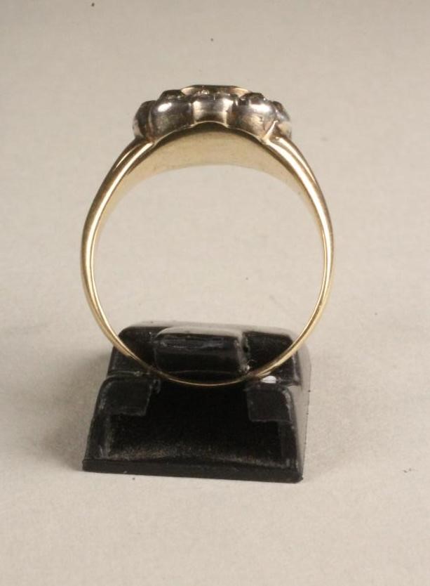 A 19TH CENTURY EMERALD AND DIAMOND CLUSTER RING Image