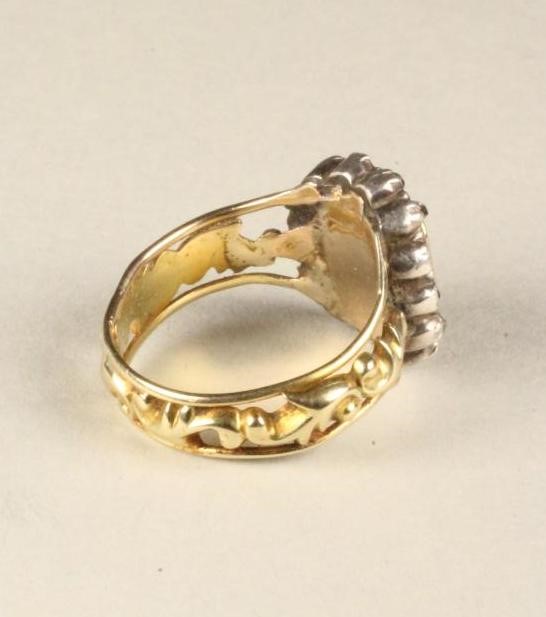 A 19TH CENTURY EMERALD AND DIAMOND RING Image