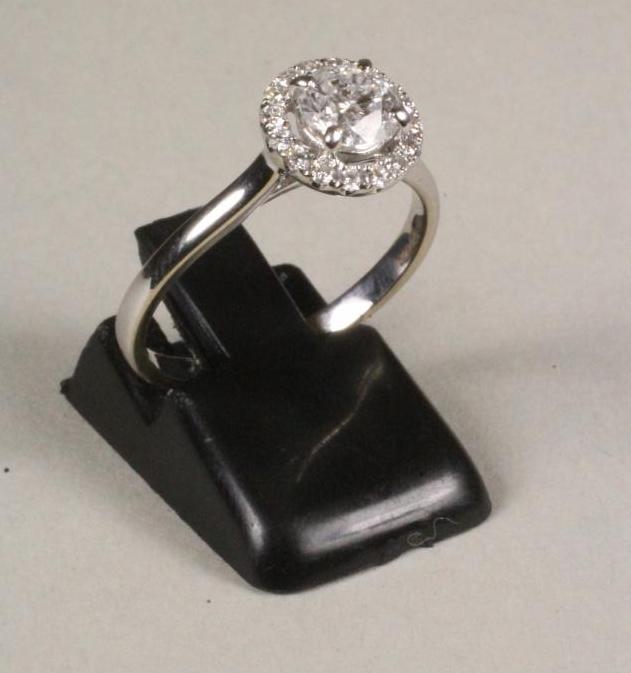 A DIAMOND CLUSTER RING Image
