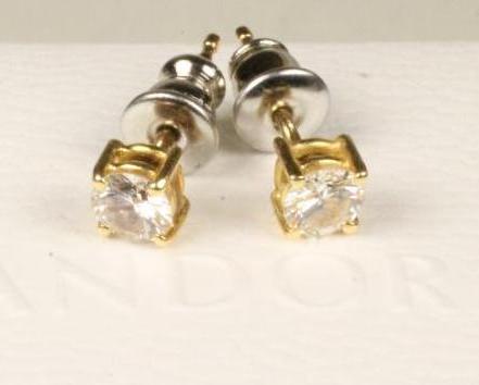 A PAIR OF DIAMOND EAR STUDS Image