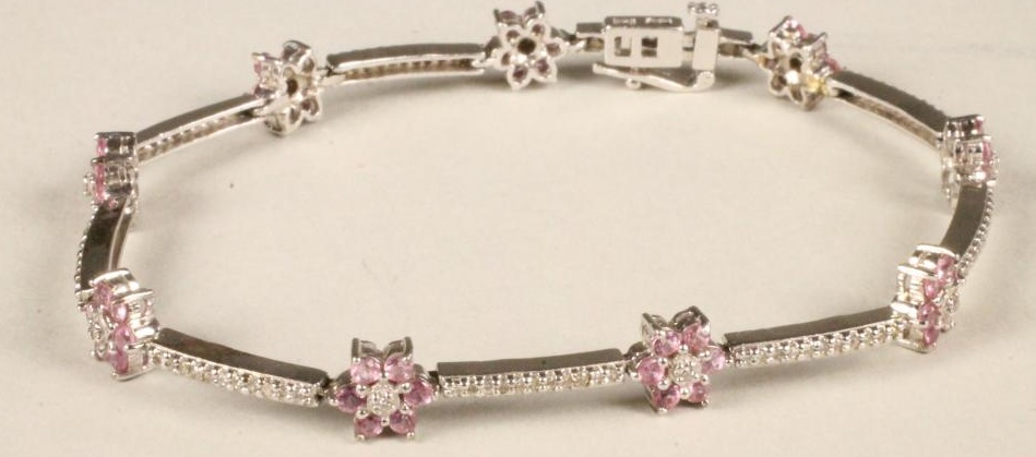 A PINK SAPPHIRE AND DIAMOND BRACELET Image