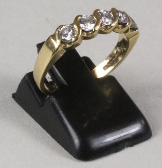 A DIAMOND HALF HOOP ETERNITY RING Image