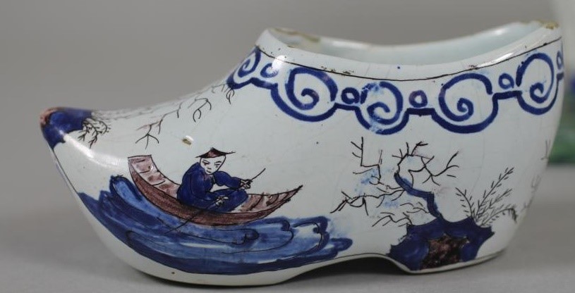 A DUTCH DELFT MODEL OF A COW Image