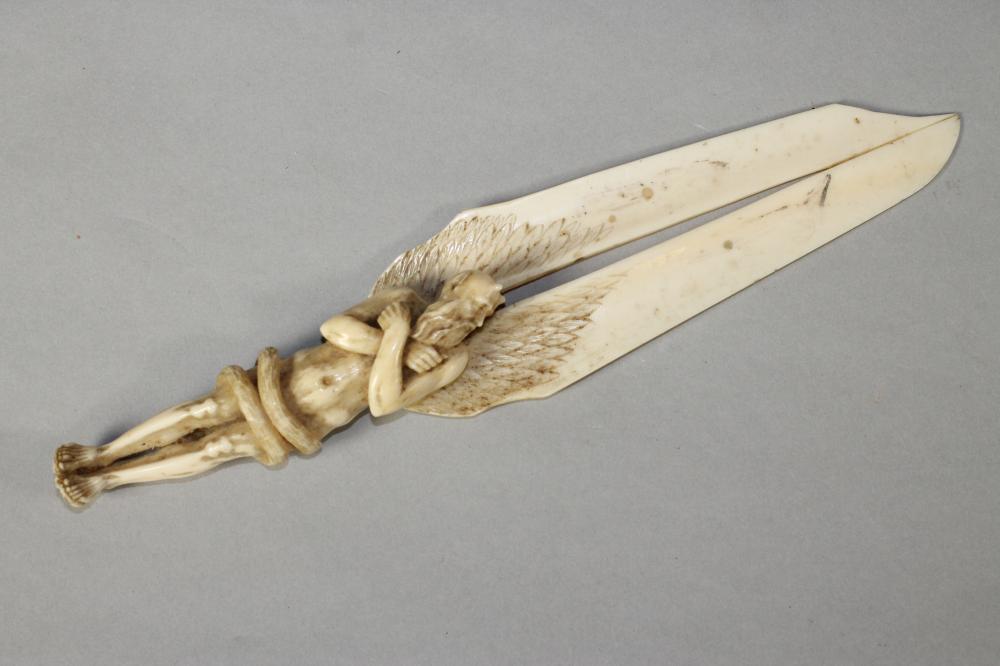 A EUROPEAN IVORY FIGURAL PAPER KNIFE Image