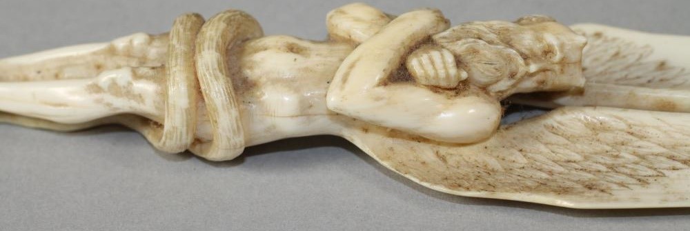 A EUROPEAN IVORY FIGURAL PAPER KNIFE Image
