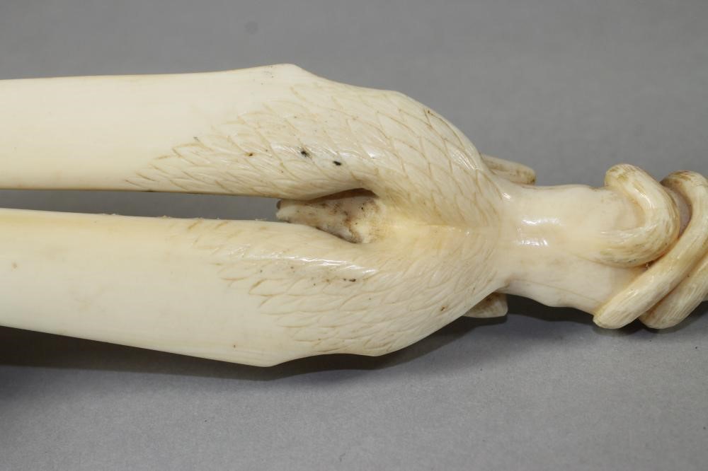 A EUROPEAN IVORY FIGURAL PAPER KNIFE Image