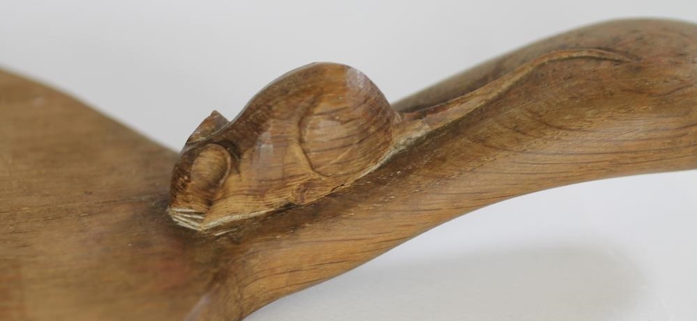 AN ADZED OAK CHEESE BOARD by Robert Thompson Image