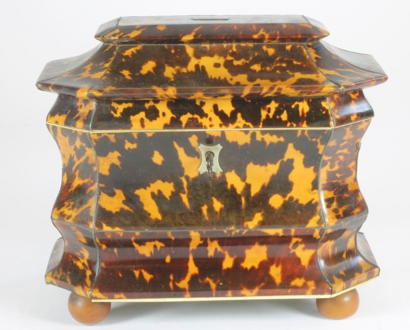 A GEORGIAN TORTOISESHELL TEA CADDY of sarcophagus form Image