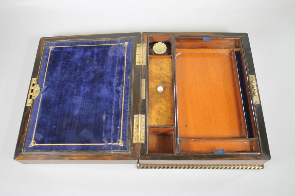 A VICTORIAN BURR WALNUT LAP DESK of plain oblong form crossbanded in coromandel and strung in brass Image