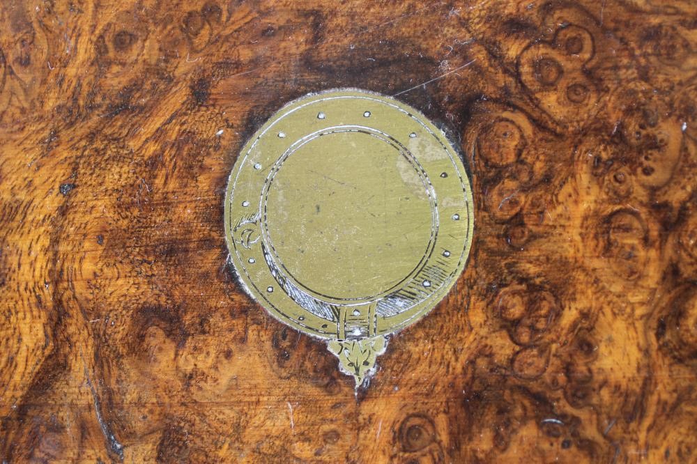 A VICTORIAN BURR WALNUT LAP DESK of plain oblong form crossbanded in coromandel and strung in brass Image