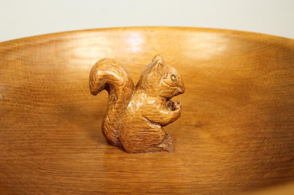 A WILF HUTCHINSON ADZED OAK FRUIT BOWL of deep circular form with carved squirrel trademark in high Image