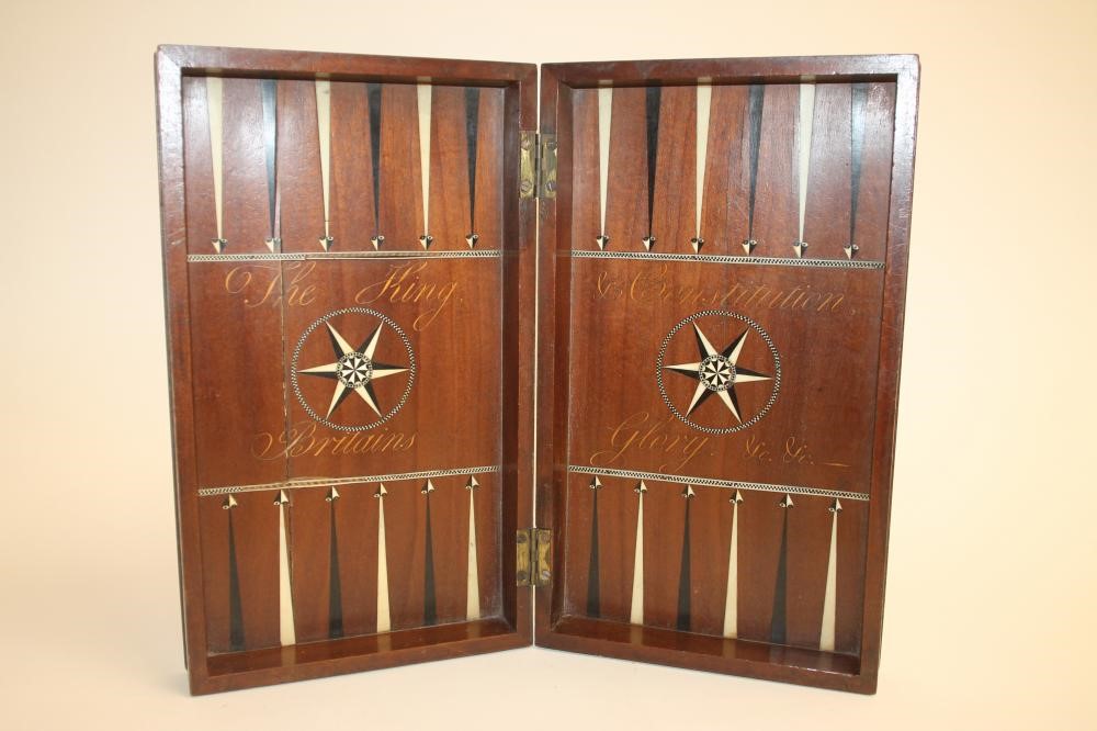 A TRAVELLING CASE/BACKGAMMON BOARD Image