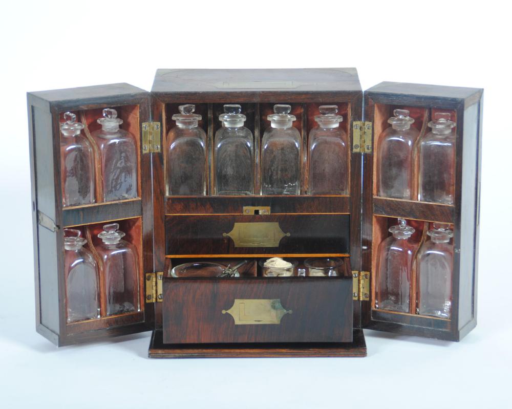 A ROSEWOOD AND BRASS BOUND TRAVELLING MEDICINE CHEST Image
