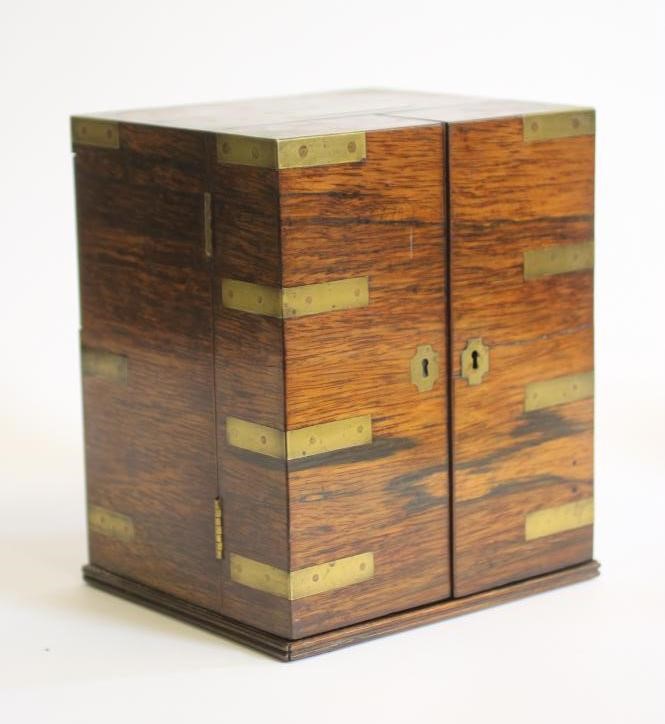 A ROSEWOOD AND BRASS BOUND TRAVELLING MEDICINE CHEST Image
