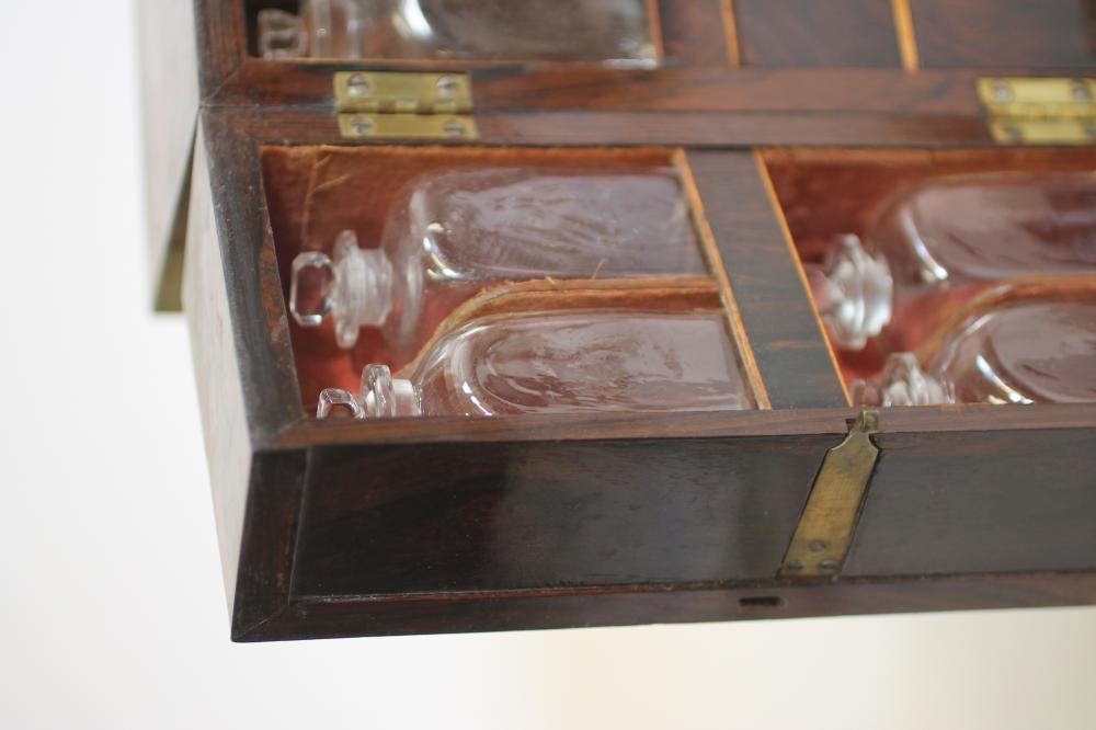 A ROSEWOOD AND BRASS BOUND TRAVELLING MEDICINE CHEST Image