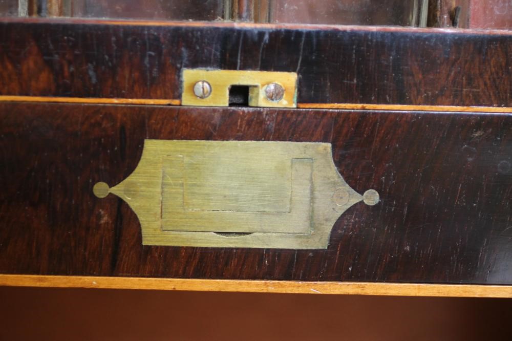 A ROSEWOOD AND BRASS BOUND TRAVELLING MEDICINE CHEST Image