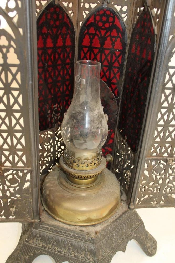 A VICTORIAN CAST IRON "CATHEDRAL" STOVE Image