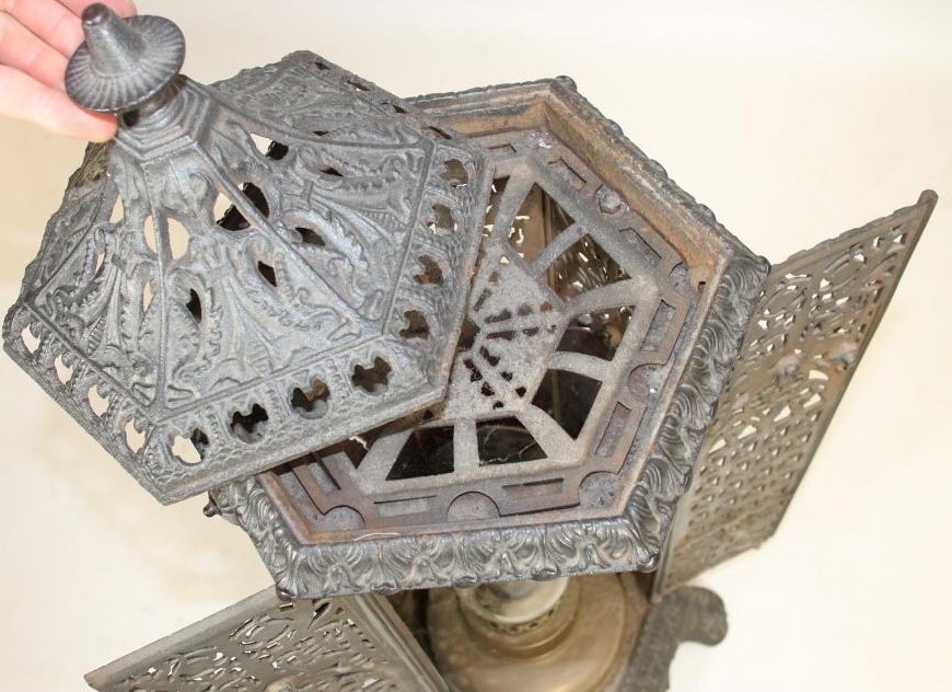 A VICTORIAN CAST IRON "CATHEDRAL" STOVE Image