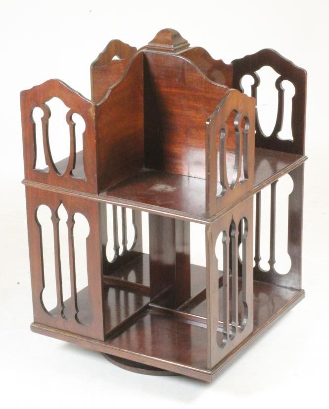 A MAHOGANY TABLE TOP REVOLVING BOOKCASE Image