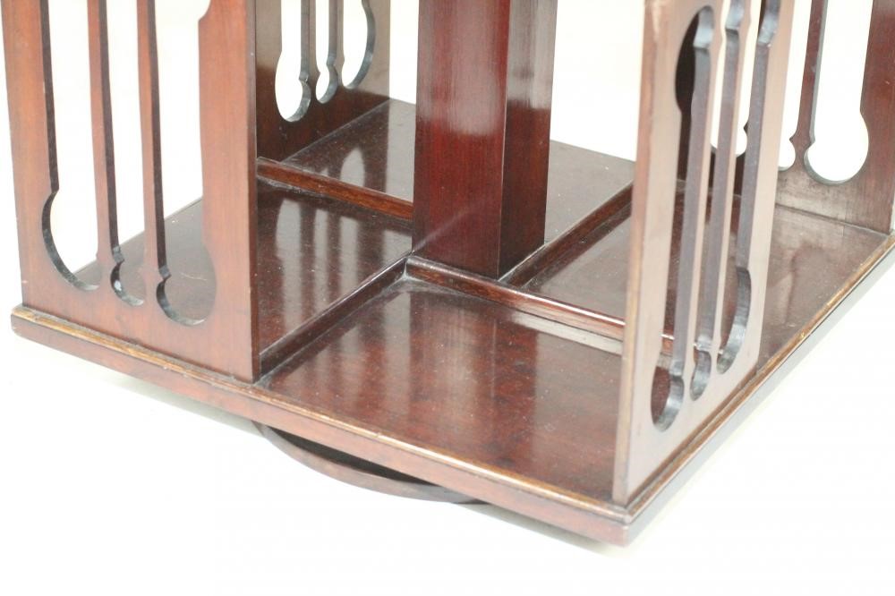 A MAHOGANY TABLE TOP REVOLVING BOOKCASE Image